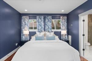 Ένα ή περισσότερα κρεβάτια σε δωμάτιο στο The Blue Bungalow retreat