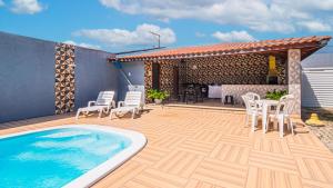 Πισίνα στο ή κοντά στο Casa com WiFi, churrasqueira e otima localizacao