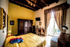 Posteľ alebo postele v izbe v ubytovaní San Gennaro B&B