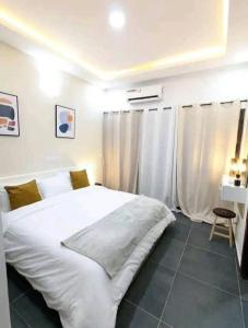 เตียงในห้องที่ Résidence Saphyr