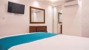 Postel nebo postele na pokoji v ubytování Cataleya Hotel