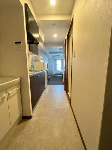 Cucina o angolo cottura di 岛之内Leopard心斎橋602 步行5分钟心斋桥商业区