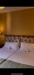 Cama o camas de una habitación en Hotel Colomers