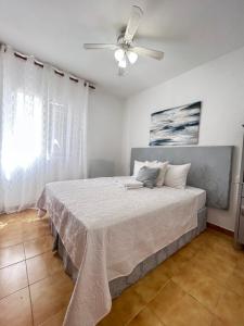 Postel nebo postele na pokoji v ubytování Terra Apartments