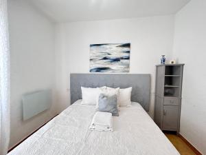 Postel nebo postele na pokoji v ubytování Terra Apartments