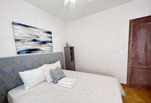 Postel nebo postele na pokoji v ubytování Terra Apartments