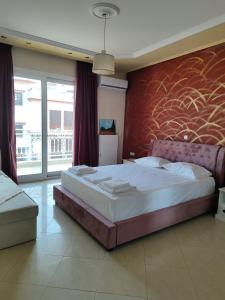 Postel nebo postele na pokoji v ubytování Maria in Maries