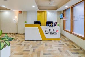 an office with a reception desk and chairs at Super Hotel O The Signature Inn in Indirapuram