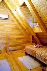 Letto o letti in una camera di Magical Log House