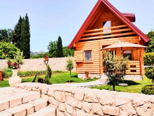 Giardino di Magical Log House