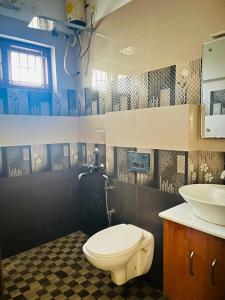 Koupelna v ubytování Elephant Coco Homestays Deluxe