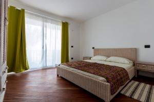 Postel nebo postele na pokoji v ubytování Villa ao Mar