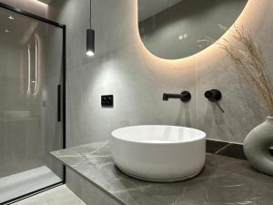 Kúpeľňa v ubytovaní Apartamento Playa Valencia Beach + 18 fotografií