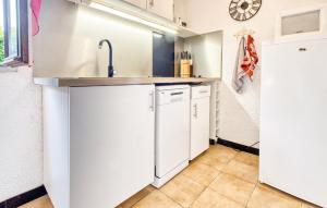 Kuchyň nebo kuchyňský kout v ubytování Charmante Maison À La Campagne