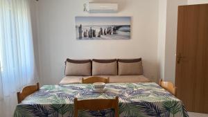 Postel nebo postele na pokoji v ubytování Family apartment Krivokapic