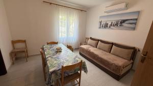 Posezení v ubytování Family apartment Krivokapic