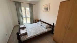 Postel nebo postele na pokoji v ubytování Family apartment Krivokapic