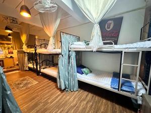 Postel nebo postele na pokoji v ubytování MINUM Hostel