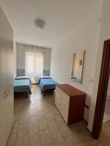 Postel nebo postele na pokoji v ubytování Il Timone