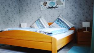 Katil atau katil-katil dalam bilik di Manus Ferienwohnung +8 gambar