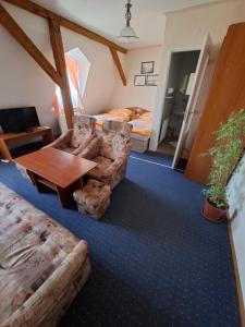 Postel nebo postele na pokoji v ubytování Hotel Alster