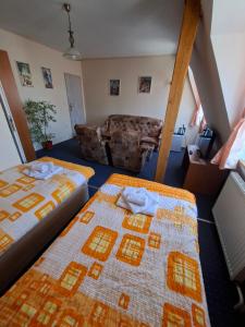 Postel nebo postele na pokoji v ubytování Hotel Alster
