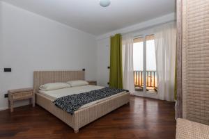 Postel nebo postele na pokoji v ubytování Villa ao Mar