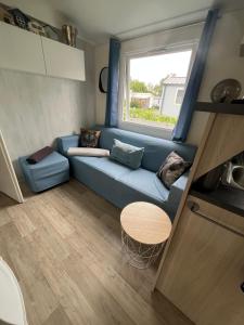 Posezení v ubytování Mobil home confort XL,camping la pommeraie, piscine et océan, concarneau et pont aven