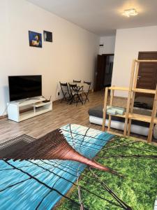 a living room with a kite on the floor at Vadim's guesthouse in Sibiu