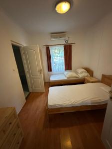 Postel nebo postele na pokoji v ubytování Hátsó Udvar Kuckó + 6 fotografií