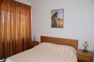 Postel nebo postele na pokoji v ubytování Maria's Filoxenia Suites