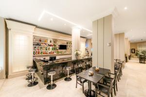 A cozinha ou cozinha compacta de Rockefeller by Slaviero Hotéis