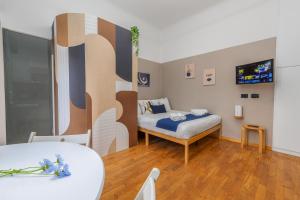 Ένα ή περισσότερα κρεβάτια σε δωμάτιο στο Design Nook - In the heart of the Design District