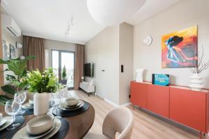 Posezení v ubytování Noho Central Spodek, sauna, parking, siłownia + 10 fotografií