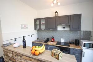 Kuchyň nebo kuchyňský kout v ubytování Konavle Village Apartment