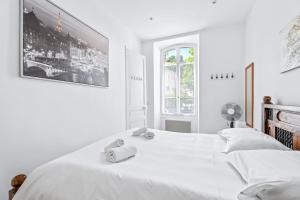 Posteľ alebo postele v izbe v ubytovaní Appartement Beau Site - Welkeys