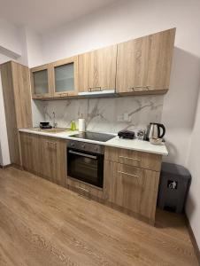 Η κουζίνα ή μικρή κουζίνα στο Serenity apartment sea view