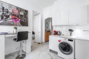 Kuchyňa alebo kuchynka v ubytovaní Appartement Beau Site - Welkeys + 4 fotografie
