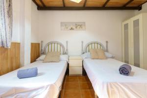 Posteľ alebo postele v izbe v ubytovaní Cortijo rural los Erales