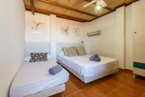 Posteľ alebo postele v izbe v ubytovaní Cortijo rural los Erales
