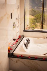 Koupelna v ubytování Chalé Encantos do Frade