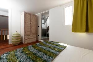Postel nebo postele na pokoji v ubytování Villa ao Mar