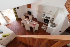 Kuchyň nebo kuchyňský kout v ubytování Villa ao Mar