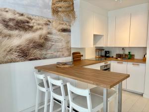 クノック・ヘイストにあるSfeervol en lichtrijk appartement centrum Knokkeのギャラリーの写真