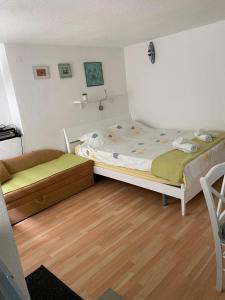 Posteľ alebo postele v izbe v ubytovaní Skenderi Apartment Studio