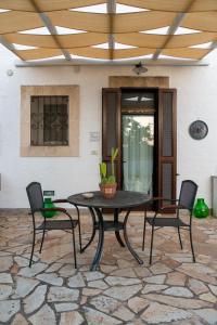 Patio nebo venkovní prostory v ubytování Masseria 77