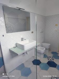 Koupelna v ubytování Monteroni Haus