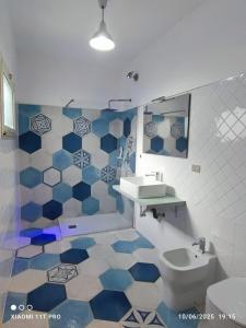 Koupelna v ubytování Monteroni Haus