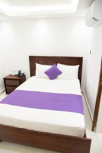 Postel nebo postele na pokoji v ubytování Cataleya Hotel