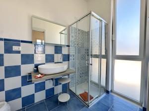 a bathroom with a sink and a shower at tulip 59 in Gallipoli